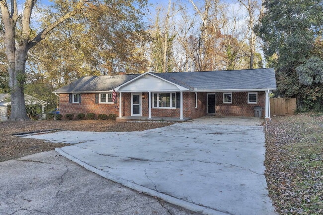 Photo - Stylishly Updated 3BR/1.5BA Residence with Exclusive Fenced Outdoor Space & Outbuilding Apartment