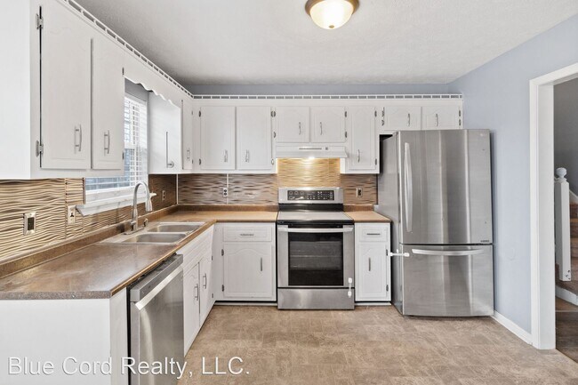 Building Photo - 3 br, 1.5 bath House - 1011 Cooper Drive