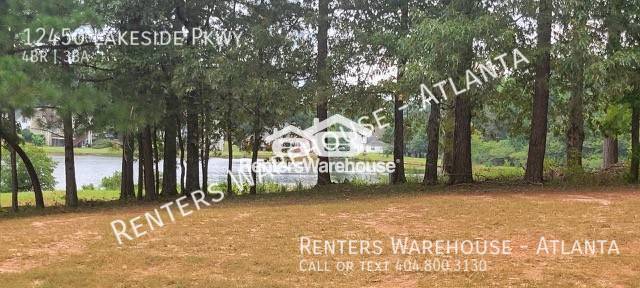 Building Photo - Stunning 4 Bedroom 2.5 Bath Lakeside Home ...