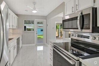 Building Photo - 320 NW 51st Ct
