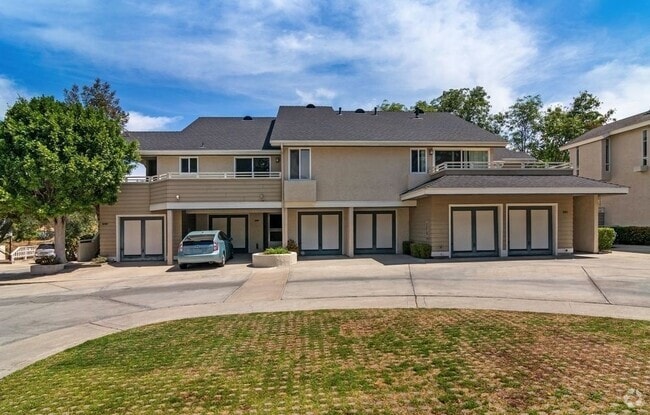 Middle two garages, entryway on the left - 5193 68th St
