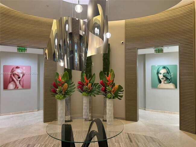 Building Photo - 10275 Collins Ave