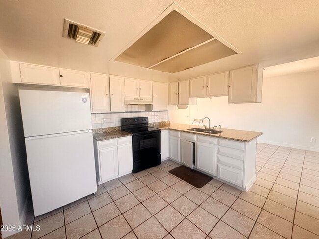 Building Photo - 4310 N 90th Dr