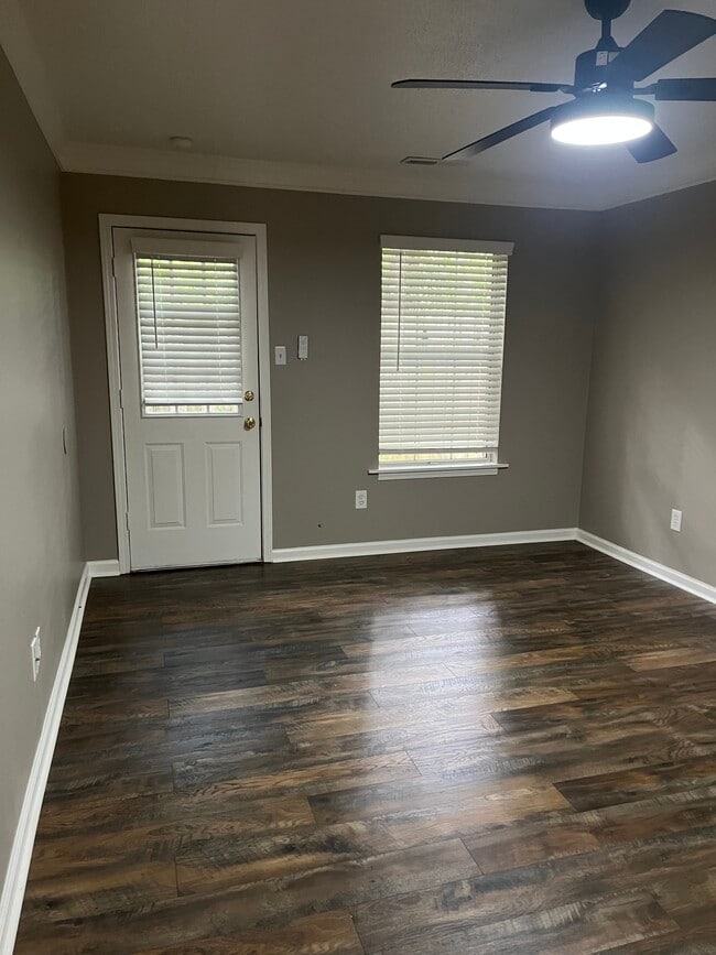 Downstairs bedroom with patio view - 445 Brackinhouse Pl