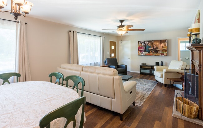 living room with 70 in TV - 4150 Ackerman Blvd