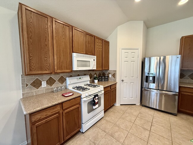 Foto del edificio - 9010 Heather Springs Dr