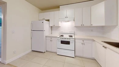 Building Photo - 8445 15th Av