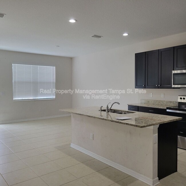 Foto del edificio - 6409 Tillandsia Pl