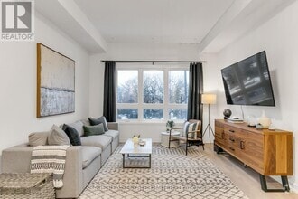 Building Photo - 3686-3686 St Clair Ave E