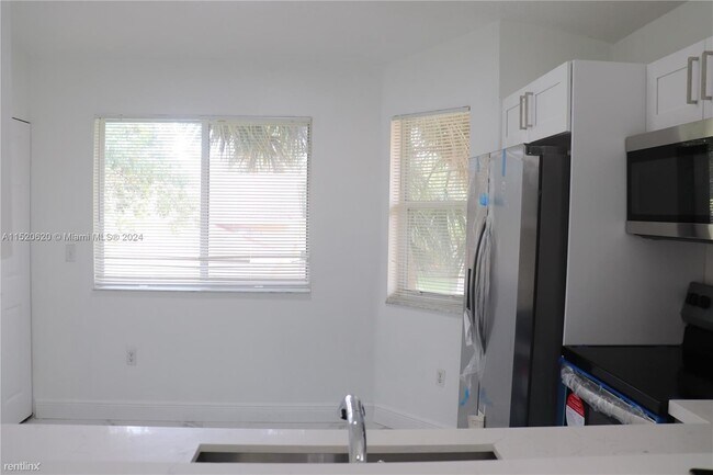 Foto del edificio - 3 br, 2 bath House - 631 NW 79th Ter Apt 204