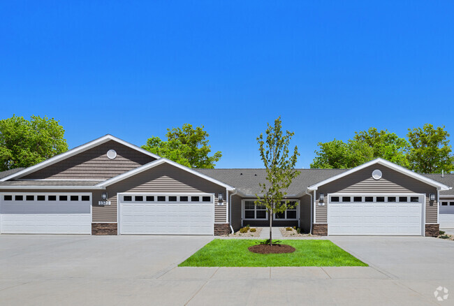 Apartments with Two-Car Attached Garages - Redwood DeWitt