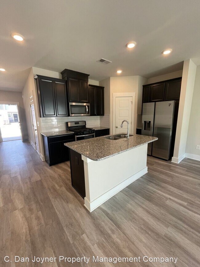 Foto del edificio - 3 br, 2.5 bath House - 406 Windsinger Lane