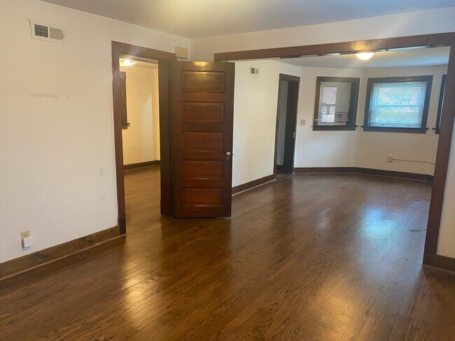living room with bedroom entrance - 4246 N Keeler Ave