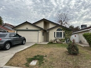Building Photo - 5567 W Sample Ave