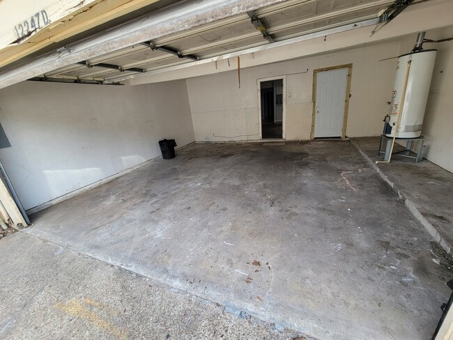 2 car garage/storage/laundry hookup - 12247 W Village Dr