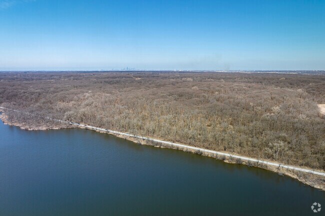 Hundreds of acres of woods line the borders of Palos Hills on the shores of Sagnashekee Slough.