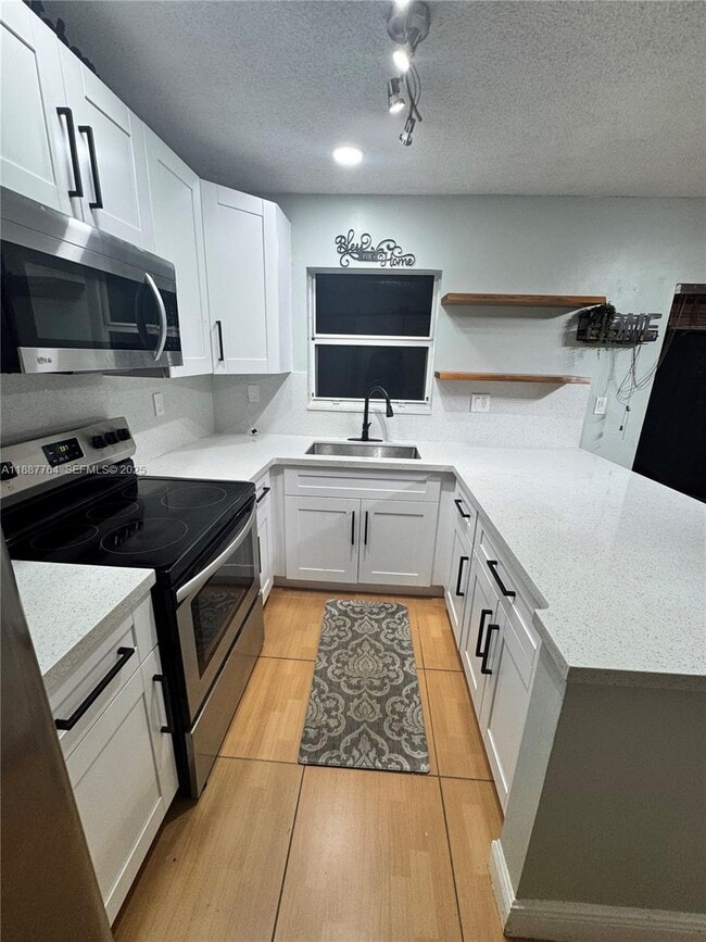 Building Photo - 7005 NW 173rd Dr