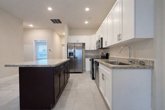 Building Photo - 3221-3409 SW 8th Pl