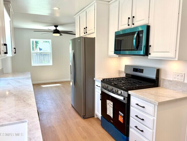 Building Photo - 7741 De Soto Ave