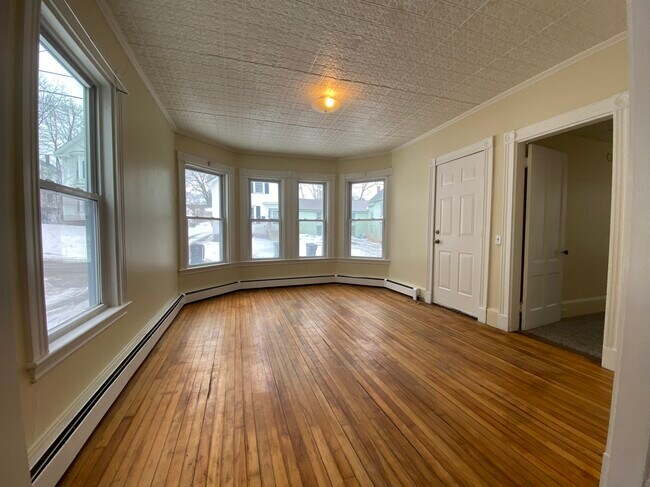 Historic tin ceilings and hardwood floors. - 15 Autumn St