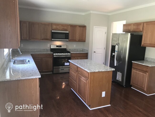 Building Photo - 5509 Southwest Stone Cove Drive Southwest,...