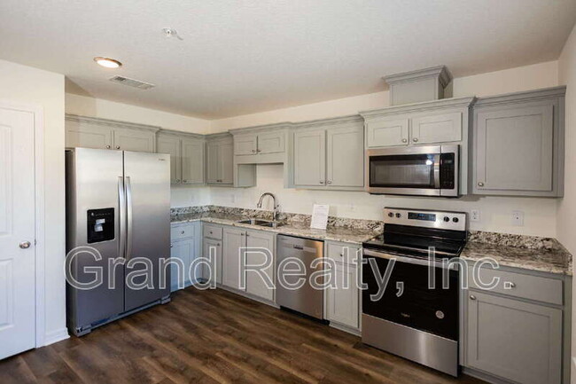 Foto del edificio - 6801 Whitney Polk Ct
