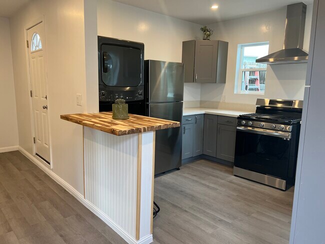 Table can be used as table for two or perfect for folding clothes. - 9300 Benson Way