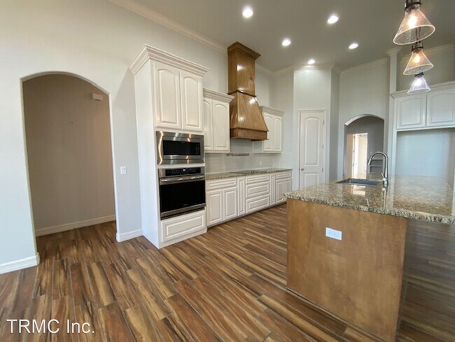 Foto del edificio - 5 br, 3 bath House - 7826 STAMPEDE DR