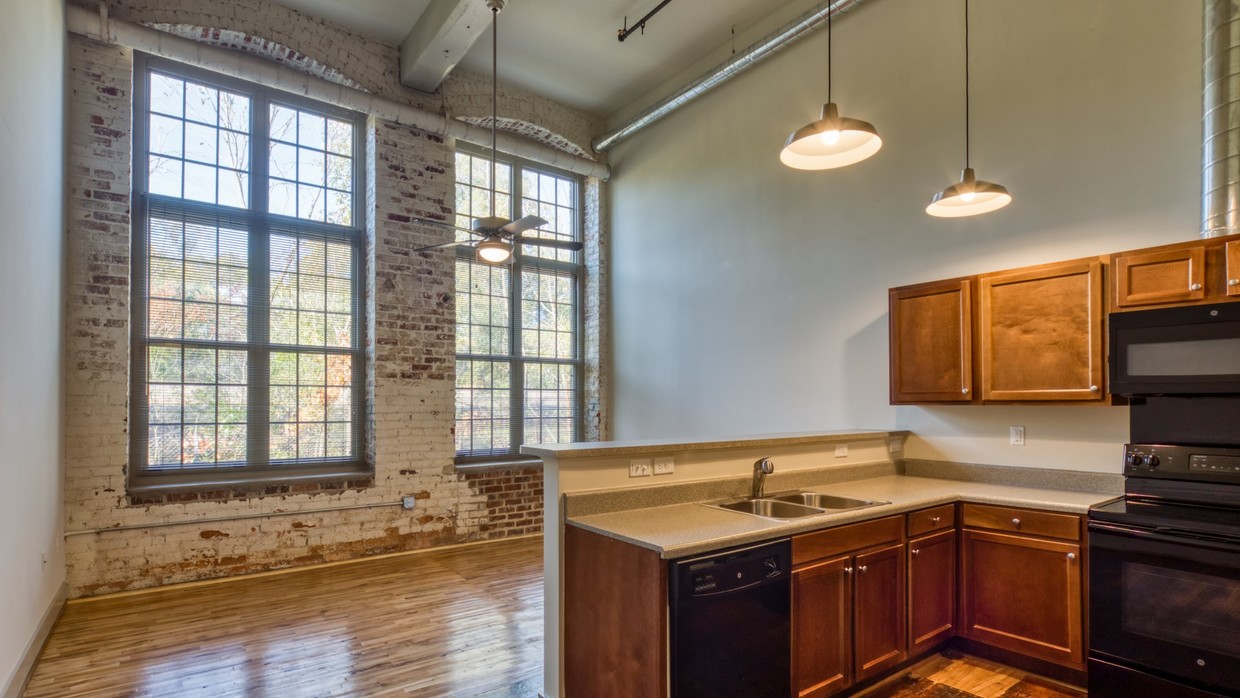 Historic charm blends with modern features at Lofts at Sterling Mill. - Lofts at Sterling Mill