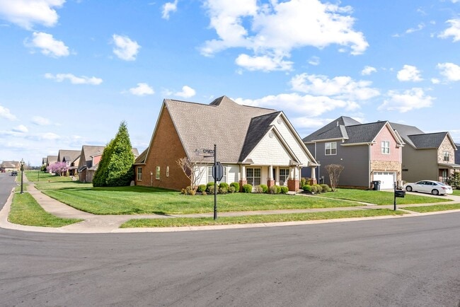 Building Photo - Pet Friendly Three Bedroom with Bonus!