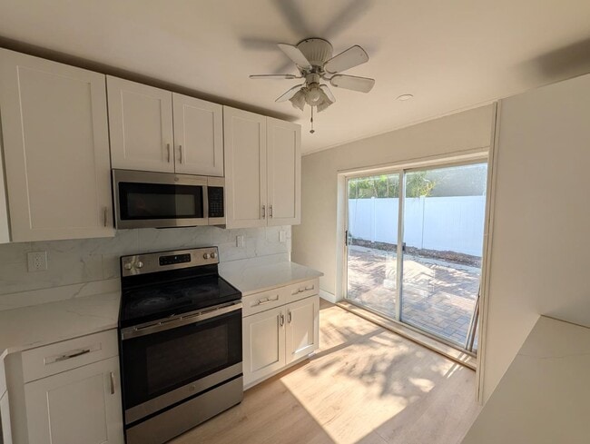 Photo - Charming Remodeled 3BD/1BA + Bonus Room | Fenced Yard | Pet Friendly House