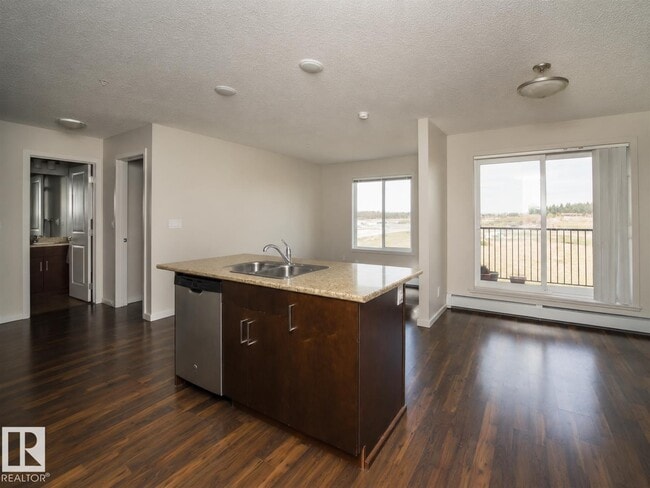 Building Photo - #325 5515 7 AV SW