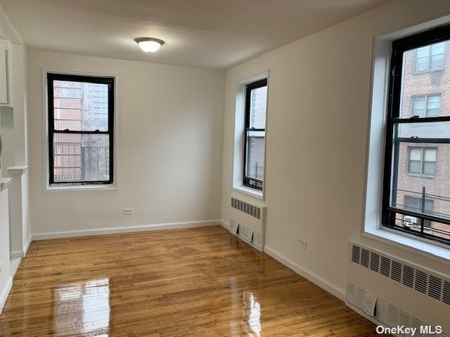 Building Photo - 102-30 Queens Blvd