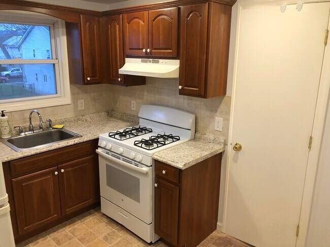 Kitchen (right side) & Bathroom Door - 106 11th Ave