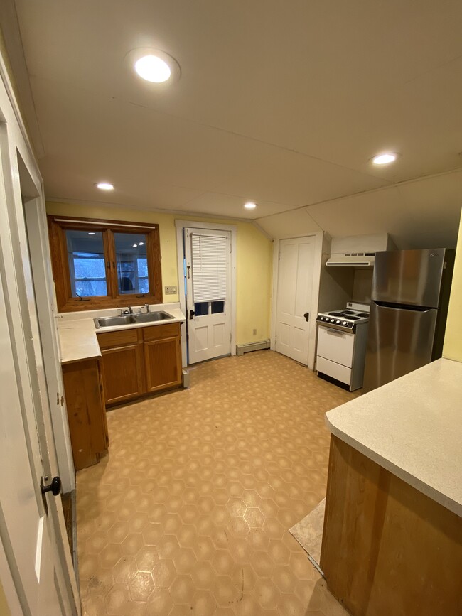 Kitchen view looking at the rear porch entrance - 581 Union St