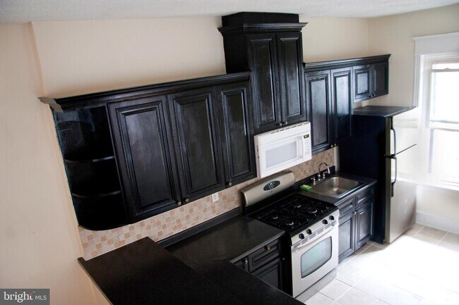Foto del edificio - 5428 W Girard Ave