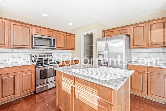 Building Photo - Natural Light. Open Flow. Prime Location.