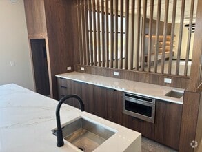 Building Photo - The Flats at Carriage Commons
