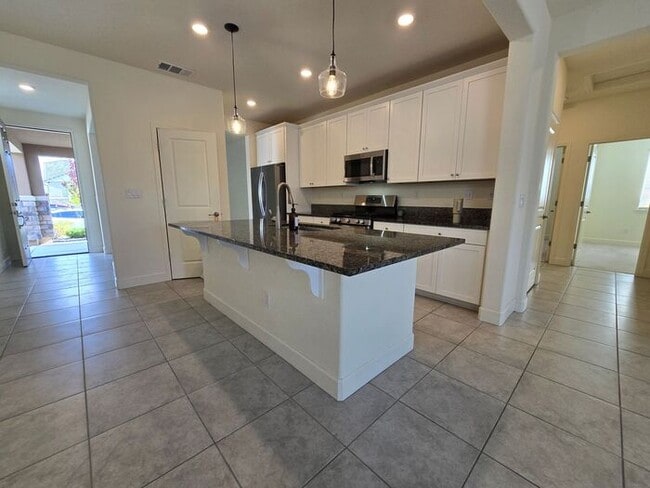 Building Photo - Beautiful Kiley Ranch Home with Open Floor Plan & Private Backyard