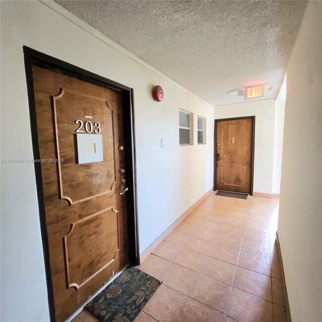 Building Photo - 7830 Dickens Ave