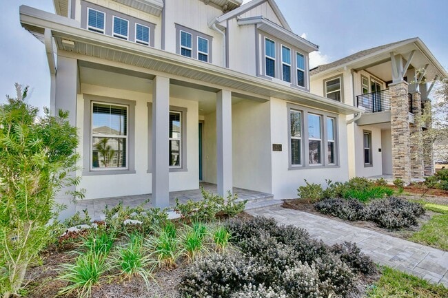 Photo - Gorgeous 4/3 Residence with a Private Back Lanai and a 2 Car Garage in the Delightful Laureate Pa... House