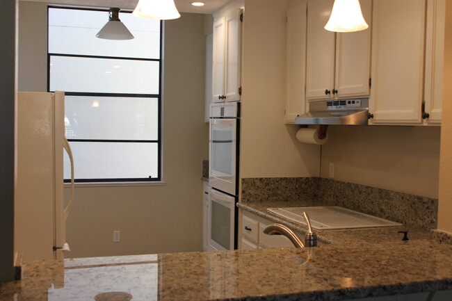 Kitchen, lots of cabinet space - 225 E Santa Inez Ave