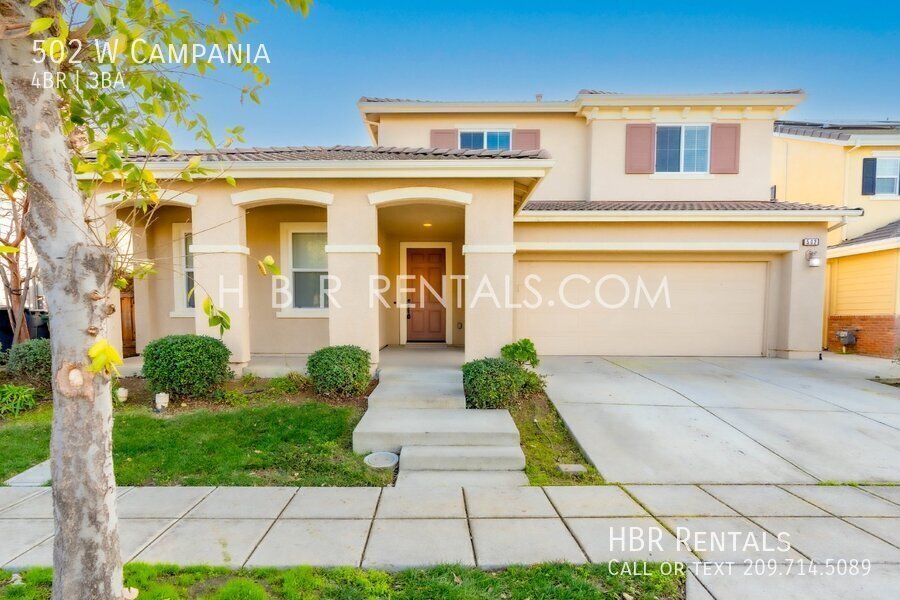 Foto principal - Spacious 4-Bed, 3-Bath Home with a Beautif...