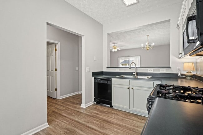 Building Photo - 3-bedroom, 2.5-bath end-unit townhome in the Garrison Square