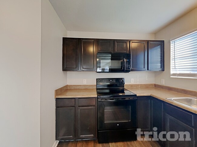 Building Photo - 6077 W Jamison Dr