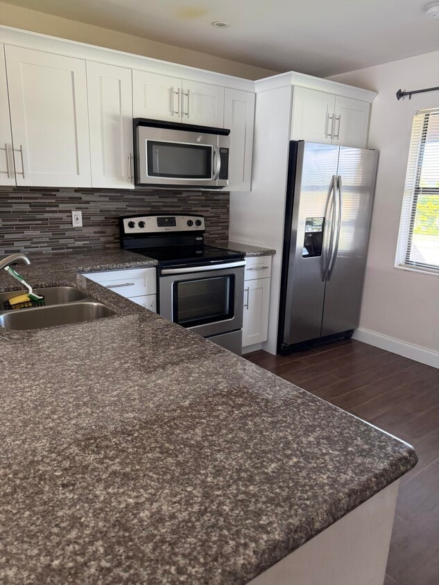 Foto principal - 8341 Boca Glades Blvd E