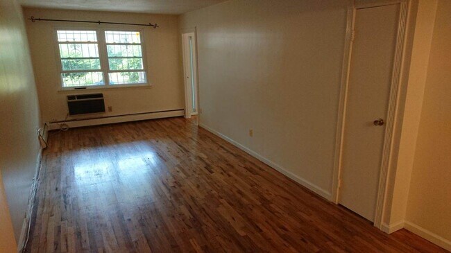 Living room leading to bedroom on the right - 6130 Booth St