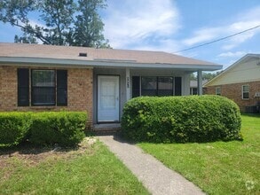 Building Photo - 207 Flores Ln