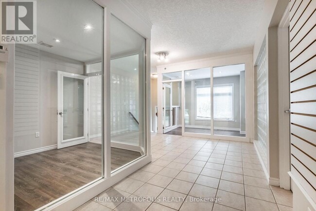 Photo du bâtiment - 619-619 Wild Ginger Ave