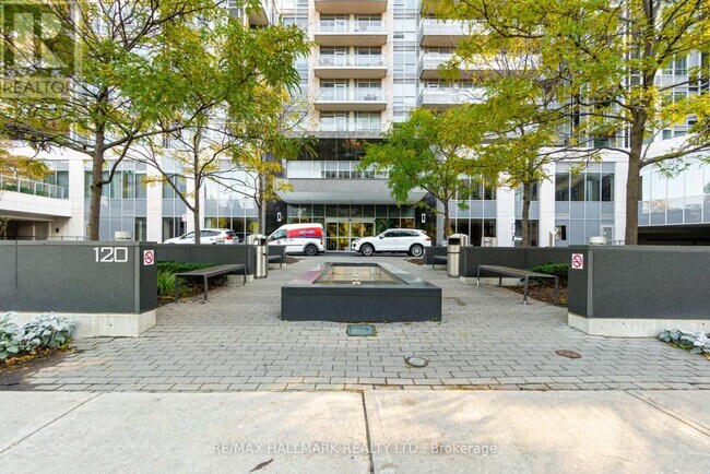 Photo du bâtiment - 120-120 Harrison Garden Blvd